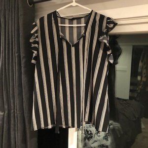 3 short sleeved shirts: 1 striped, 1 polka dot, 1 black with flowered sleeves